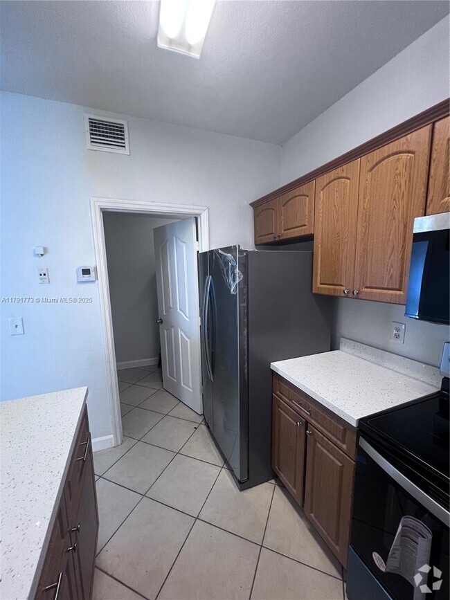 Building Photo - 18346 NW 68th Ave Unit A Rental
