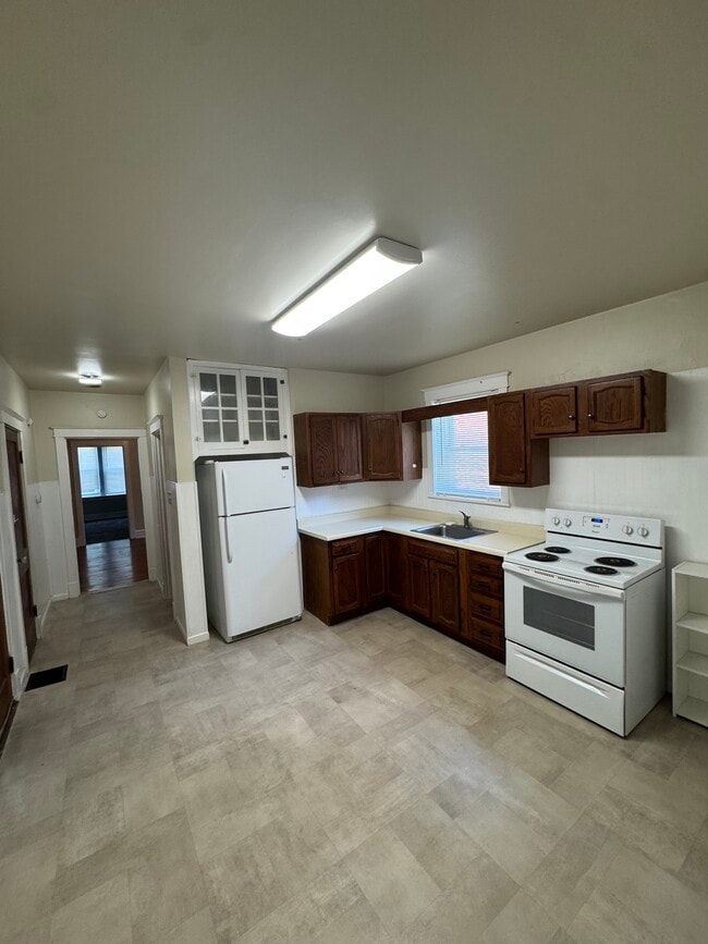 Building Photo - 4600 Quincy St Unit 1W