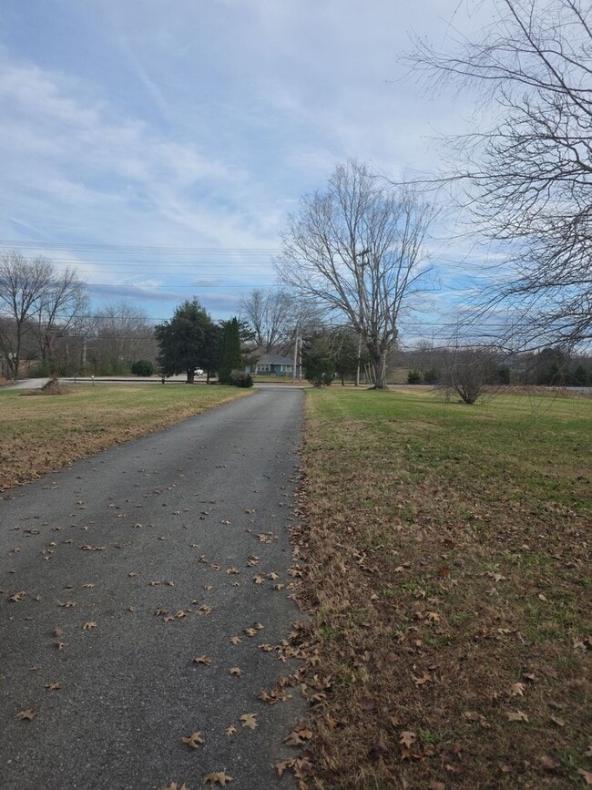 Photo - 2-Bedroom Handicap-Accessible Home with 3-Season Porch, Garage, and Large Yard