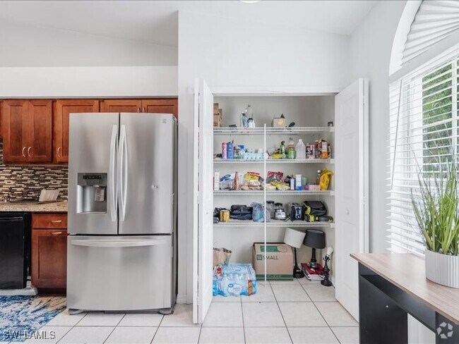 Building Photo - 4910 Cougar Ct N Unit 1-205 Rental