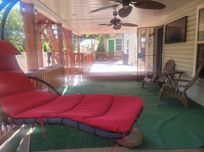 Patio with hammock and lawn chairs - 5898 Manchester Ln