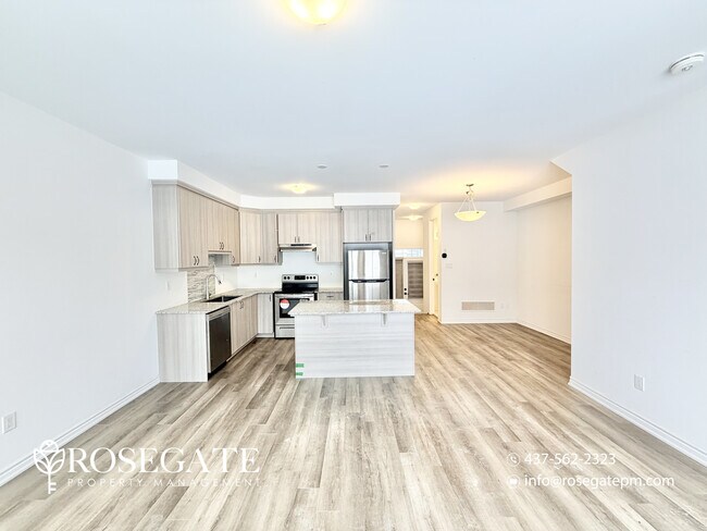 Photo - Spacious 3-Bedroom Townhouse with Parking, Backyard & Porch in Kitchener