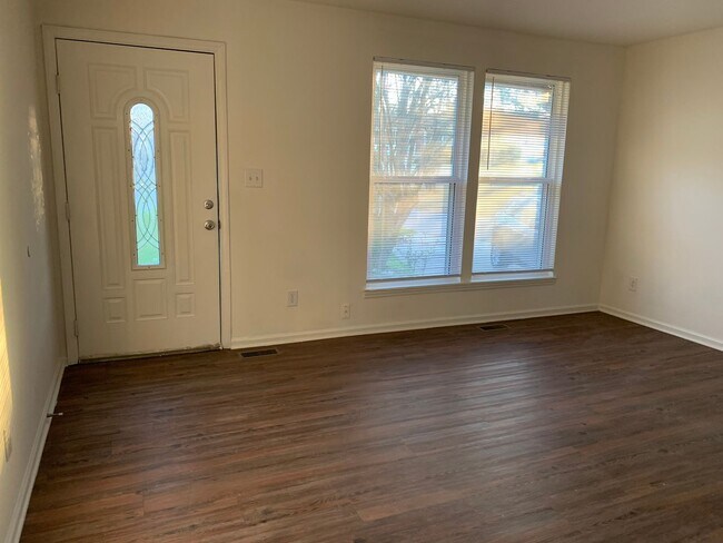 Photo - 3 bedroom & office -2 baths -2 car carport - washer/dryer hook ups - Den and formal living room- ...