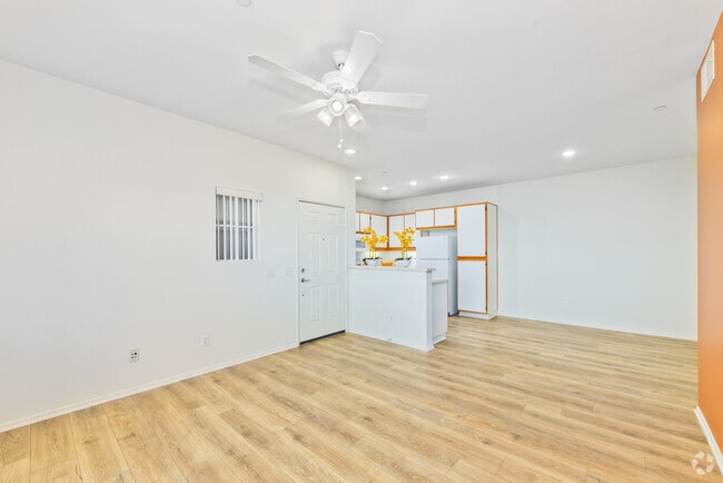 2BR, 2BA - 926SF - Living Room and Dining Room