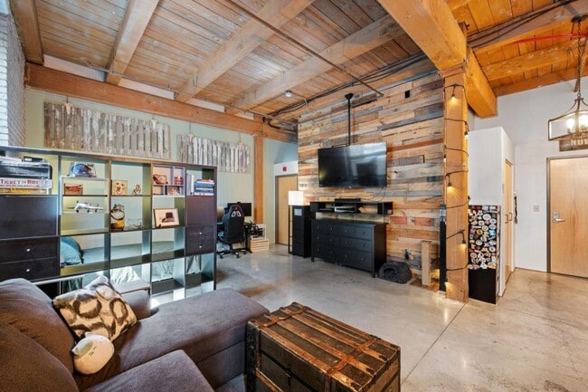 POV from Couch Towards Living Room, Bedroom and Walk-in-Closet - 127 5th St NE Unit 106