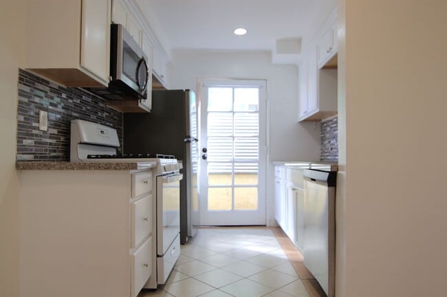 Photo - Charming 1-Bedroom Condo with Private Balcony – Gated Community Unit 105