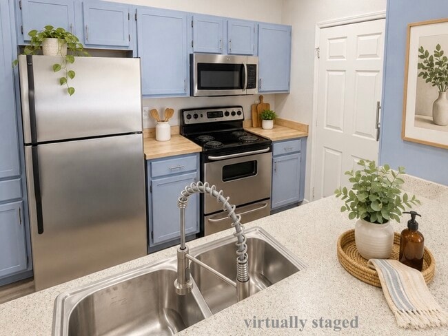 new sink, disposal, faucet.  additional pantry for extra room add - 231 W Horizon Ridge Pky Unit 2311