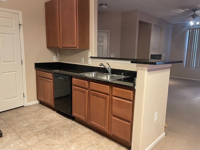 Kitchen with granite counter tops - 1465 Blue Sky Cir Unit 17-104