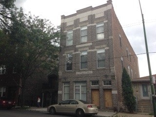 Building Photo - 3212 S Wallace St Unit 2E