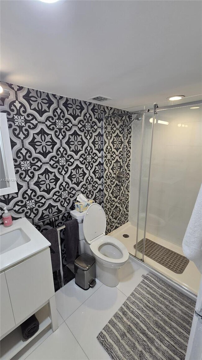 9195 Collins Ave Unit 406