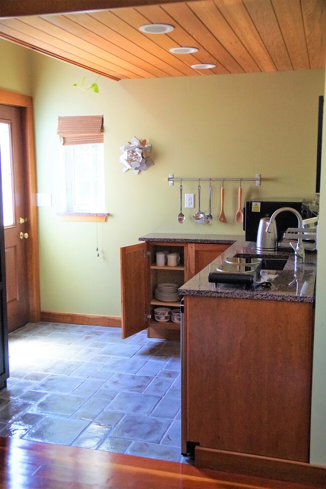 Kitchenette and outside entrance door - 69 S Shannon Ave Unit Studio