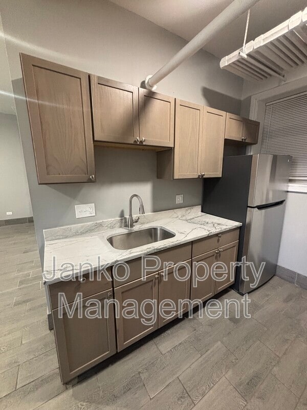 Photo - 658 E 81st St Unit G