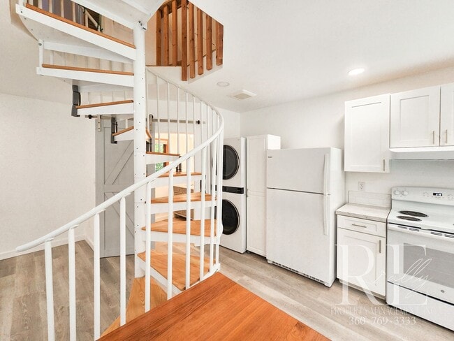 Photo - Charming Tudor Loft with Spiral Staircase & Waterfront Access