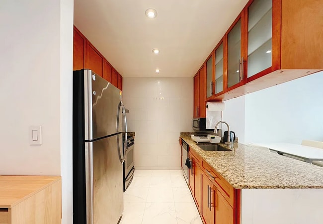 Building Photo - "Modern 1-Bed Oasis in Flushing with Pool ... Rental