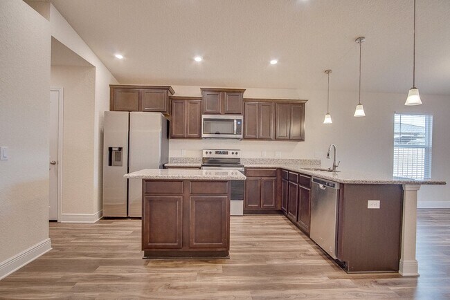 3BR, 2BA Rental Home with Open Floor Plan, Granite Kitchen, Primary Suite, 2-Car Garage & Covered...
