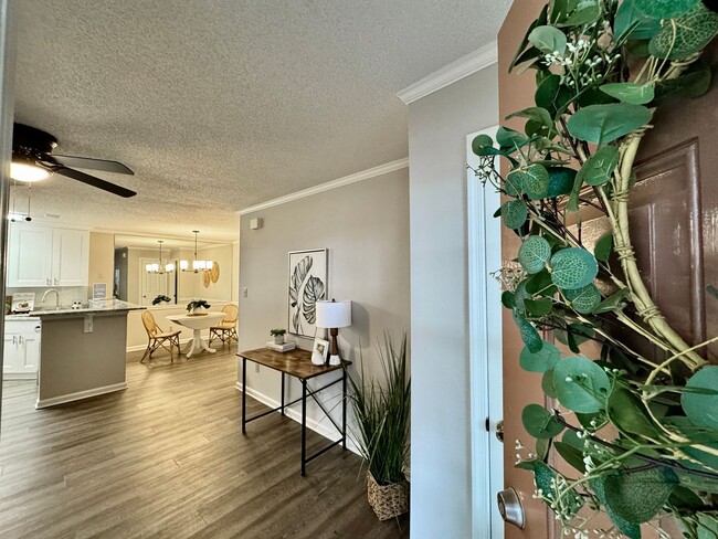 Photo - REDUCED PRICE! Updated 1st Floor/1-Level Condo Ready NOW! Includes Water, Sewer, Trash, Landscapi...