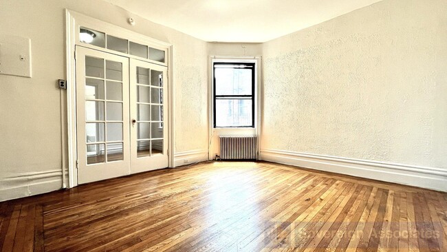 Building Photo - 45 Tiemann Pl Unit 6P Rental