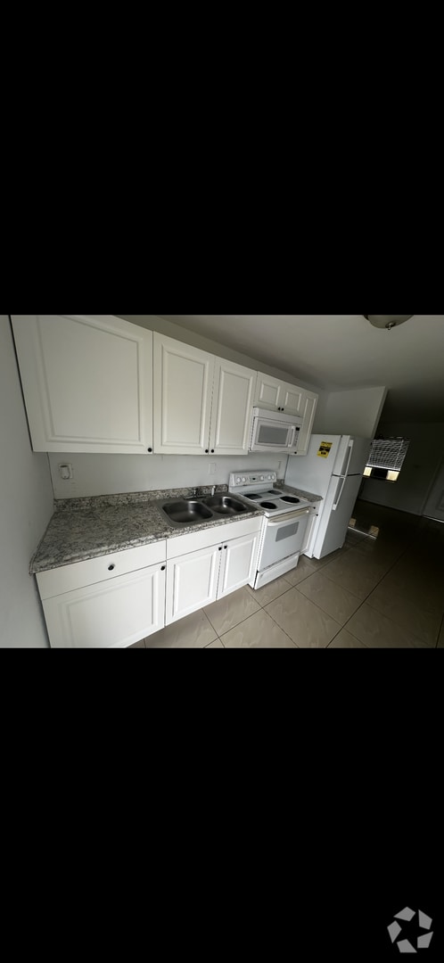 Building Photo - 809 Ave G Unit 809 Ave G - Apt B
