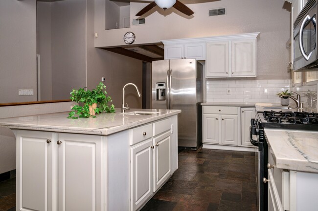 quartzite counters and 12in subway back splash and 2 sinks - 2404 P St Casa Adosada