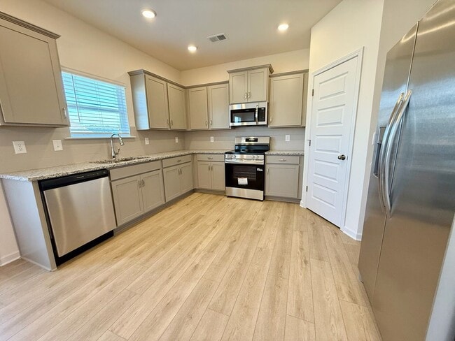 Photo - New no-fuss townhome close to everything