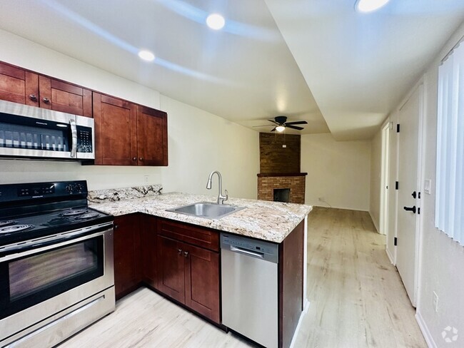 Building Photo - Renovated 2 Bedroom with New Flooring! Des... Rental