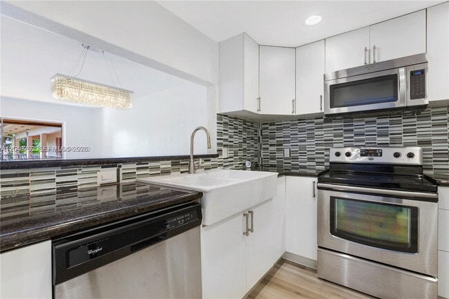 Building Photo - 11219 SW 88th St Unit C208