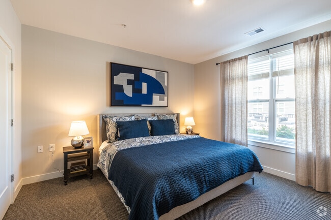 1BR, 1BA +Den - 1,044SF - Amaranth at North Brunswick, LLC