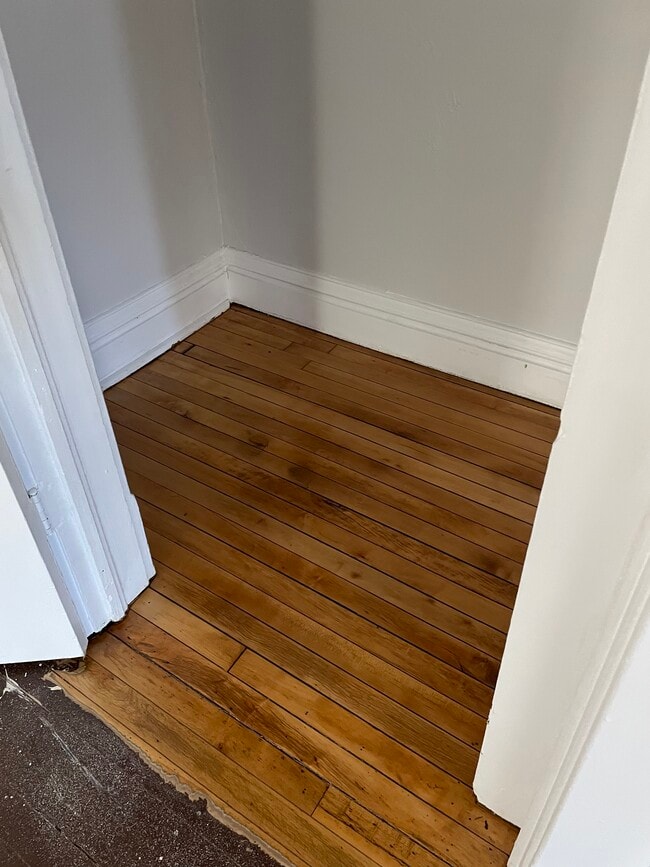 Living room closet - 432 E 7th St Unit 1