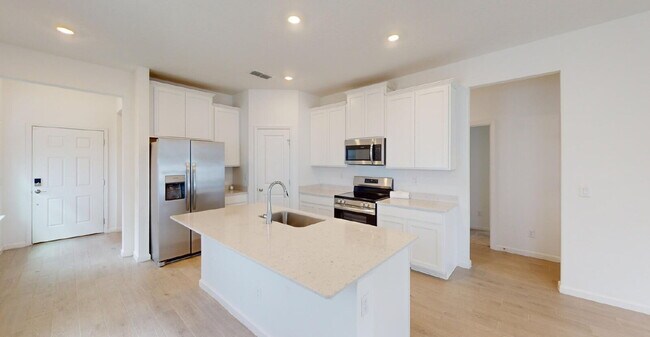 Photo - "Charming 3-Bed Oasis on Friendship Fountain Ave with 2 Full Baths and 1714 Sq Ft of Comfort!"