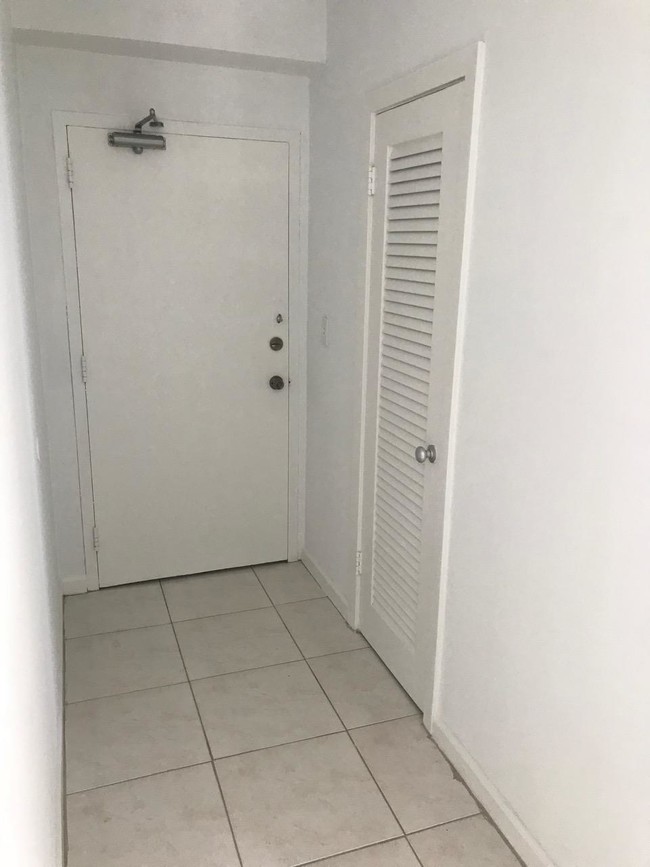 Door/hallway entrance and small closet - 1430 Brickell Bay Dr Apartment Unit 306