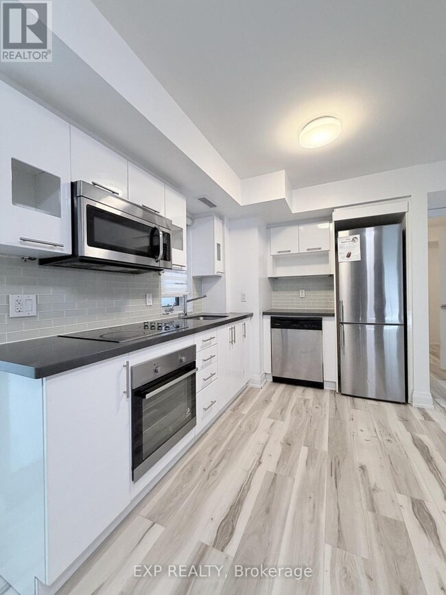 Photo - 555 Wilson Ave Unité 112-E