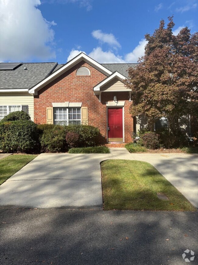 Building Photo - Well-appointed Two-Story Townhome