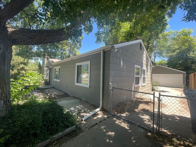 Photo - $0 DEPOSIT OPTION. CHARMING 3-BEDROOM HOME WITH LARGE YARD AND EASY ACCESS TO I-25 AND I-225