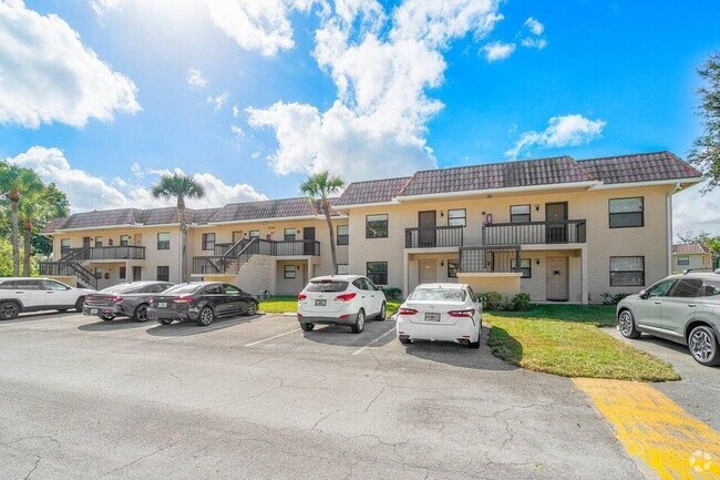 Building Photo - 6796 Palmetto Cir S Unit 102 Rental