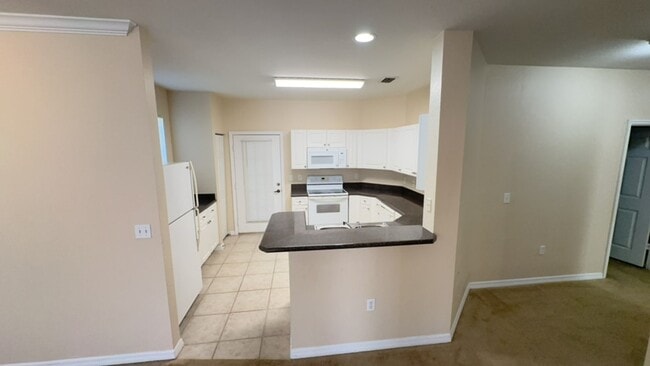 Photo - 3 BEDROOM 2 BATH 2 CAR GARAGE CONDO