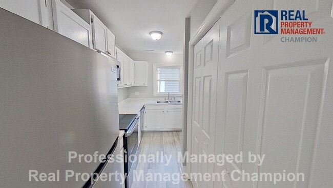 Photo - Beautifully 2 BD/1.5 BA End Unit Townhouse w/Garage