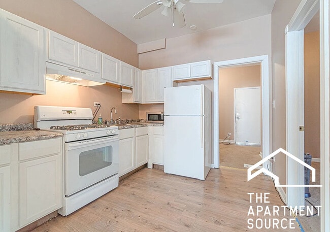 Building Photo - 1144 W 68th St Unit 1