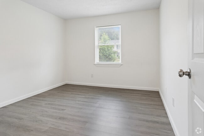 2BR, 1BA - 850SF - First Bedroom - The Courtyard Apartments