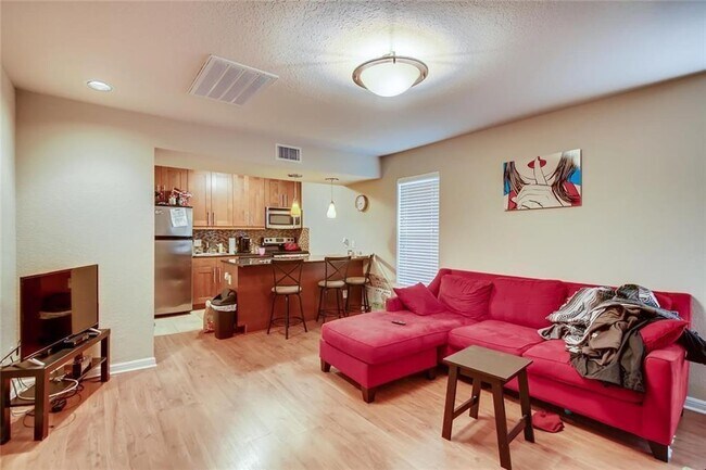 Building Photo - 7685 Northcross Dr Unit 800 Rental