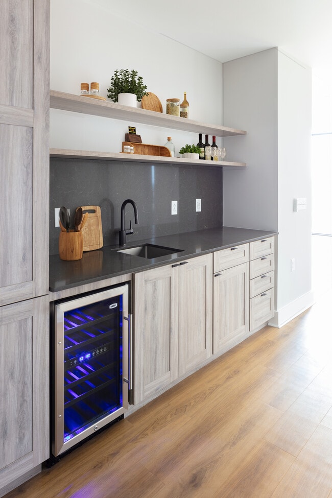 Penthouse-level Signature Collection apartment homes with wet bar and wine fridge (in select homes)