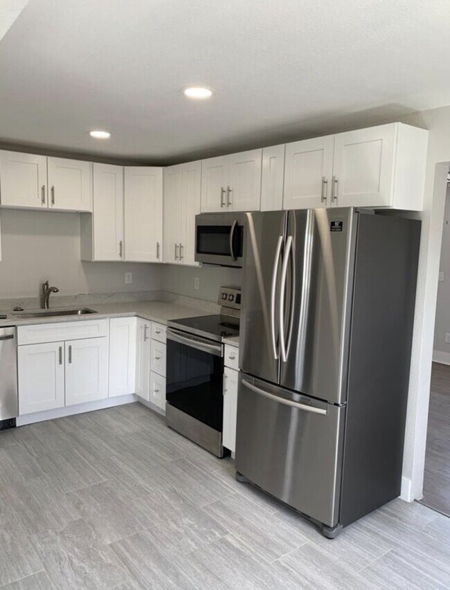 Photo - "Charming 3-Bedroom Retreat in Aurora - Cozy 1095 Sq Ft Home Ready for You!"