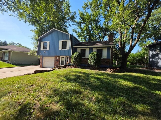 Photo - 3-Bedroom Home With Finished Basement and Storage Shed