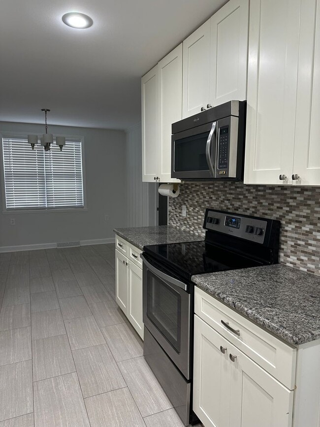 Photo - This spacious 2 bedroom home has an airy feel. Located in a neighborhood minutes from downtown an...