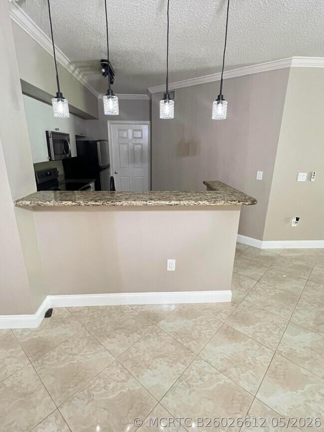 11780 St Andrews Place Unit 105