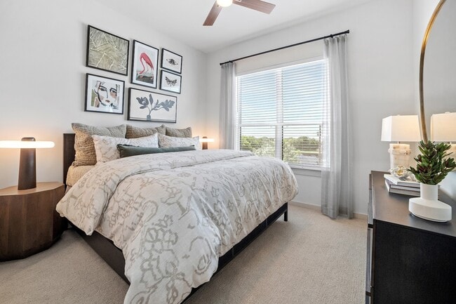 Experience ultimate relaxation in this stylishly designed bedroom filled with natural light.