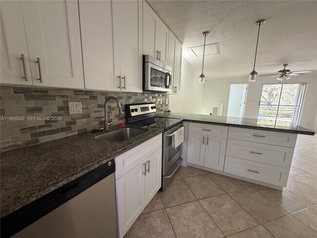 Photo - 104 Gardens Dr Unit 203