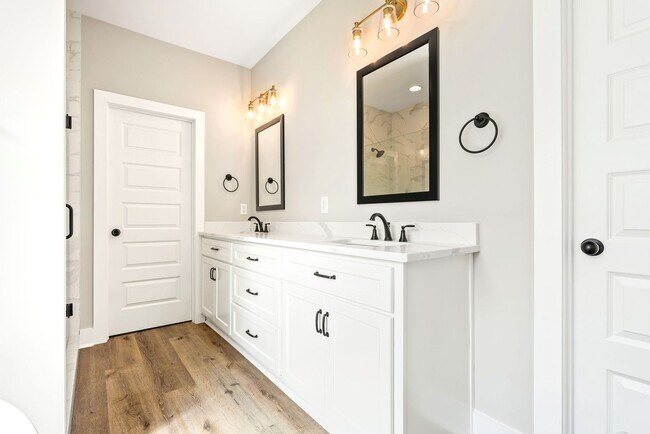 Photo - Available now! New Spacious 3 br 2.5 Ba with private 2 car garage, covered patio and fenced in ba...