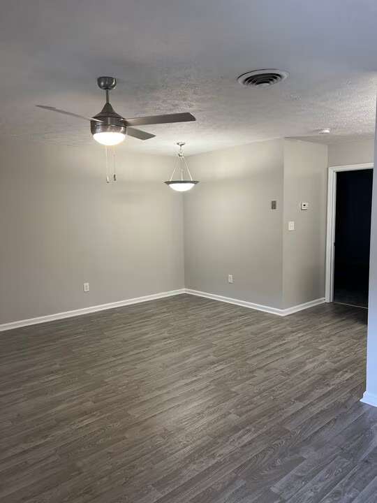 Step into Arbor Terrace, where modern design meets comfort. This spacious living area combines elegance with functionality, featuring sleek flooring and contemporary lighting. Elevate your lifestyle-schedule your tour today!