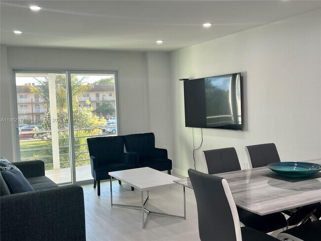 Building Photo - 8595 Sunrise Lakes Blvd Unit 207