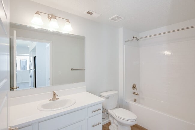 Photo - Now Leasing!  Location, Community, Quality Living! Unit E101